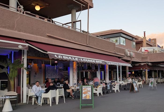 La Bulle Gay Bar in Gran Canaria. Outdoor seating at a gay-friendly lounge bar. Gay travel destination, popular with gay men.