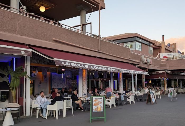 La Bulle Gay Bar in Gran Canaria. Outdoor seating at a gay-friendly lounge bar. Gay travel destination, popular with gay men.