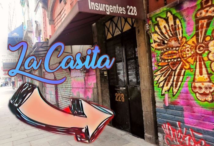La Casita CDMX gay bar entrance. Graffiti art, address Insurgentes 228. Gay travel in Mexico City, a vibrant nightlife spot.