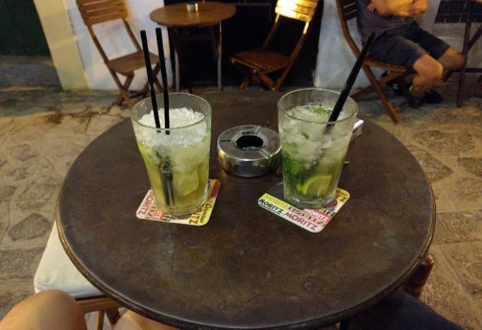 Two Mojitos at Lady D. gay bar in Ibiza. Refreshing cocktails on a table, perfect for gay travel and nightlife in Ibiza.