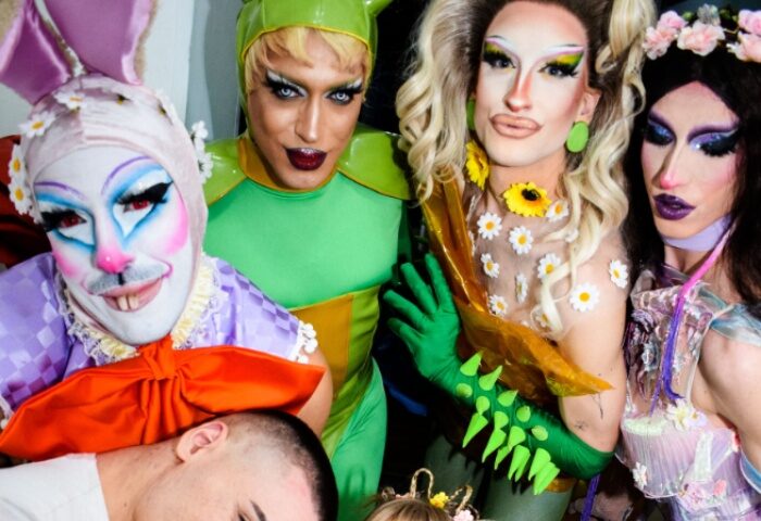 Gay Rome travel: Latte Fresco drag queens. Performers in colorful costumes and makeup pose together. Nightlife and queer culture in Italy.