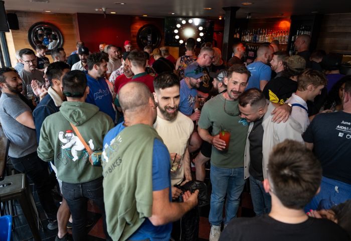 Crowded Lookout gay bar in San Francisco. Many attractive gay men are socializing and having drinks at this popular Castro district bar.