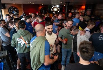 Crowded Lookout gay bar in San Francisco. Many attractive gay men are socializing and having drinks at this popular Castro district bar.