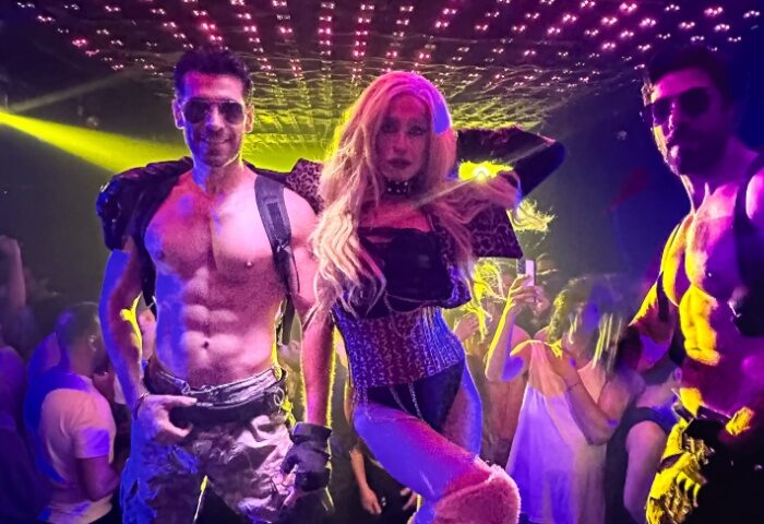 Gay Istanbul nightlife: shirtless men and a drag queen dance at Love Dance Point. Gay travel advice for Istanbul's queer scene.