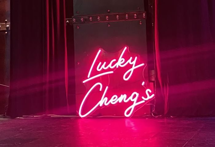 Lucky Cheng's Drag Cabaret in New York. Neon sign with the venue's name. Gay travel destination for drag shows and nightlife.