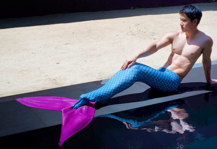 Gay-friendly Hua Hin Hotel: Merman at luxury outdoor pool, The BARAI, Hyatt Regency. Travel goals for gay men, Thailand hotel.