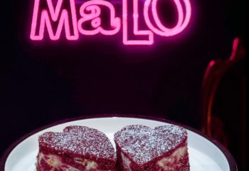 Heart-shaped cakes at Malo Glitter Bar, Rome. A sweet treat at this gay-friendly bar, a must-visit for gay men traveling in Rome.