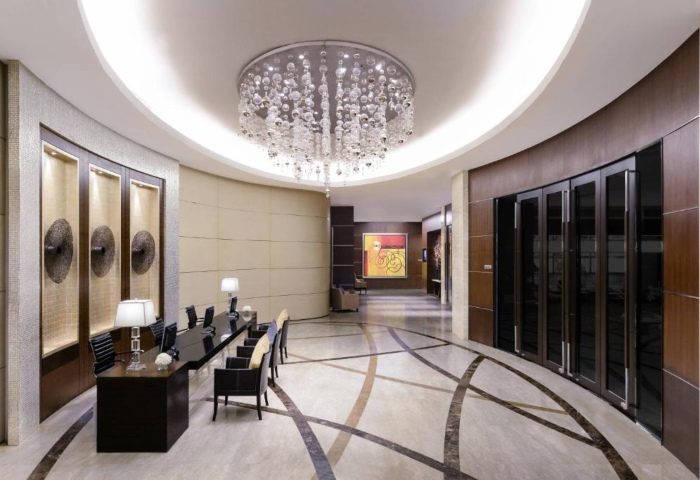 Sathorn Vista, Bangkok Marriott Executive Apartments lobby. Elegant interior, chandelier, near Silom gay bars, top hotel for gay travelers.