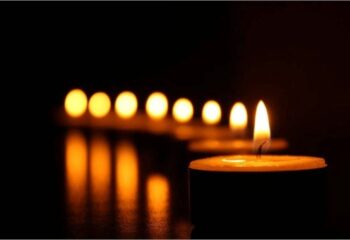 Candles glow in a Madrid massage parlor. Relaxing ambiance for gay massage in Madrid. Aromatic candles set a sensual mood.