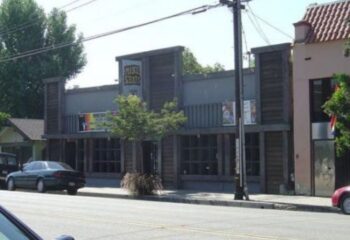 Mineshaft Fun: Exterior of Mineshaft bar, a gay travel destination. Street view of the bar's facade, a popular spot for gay men.
