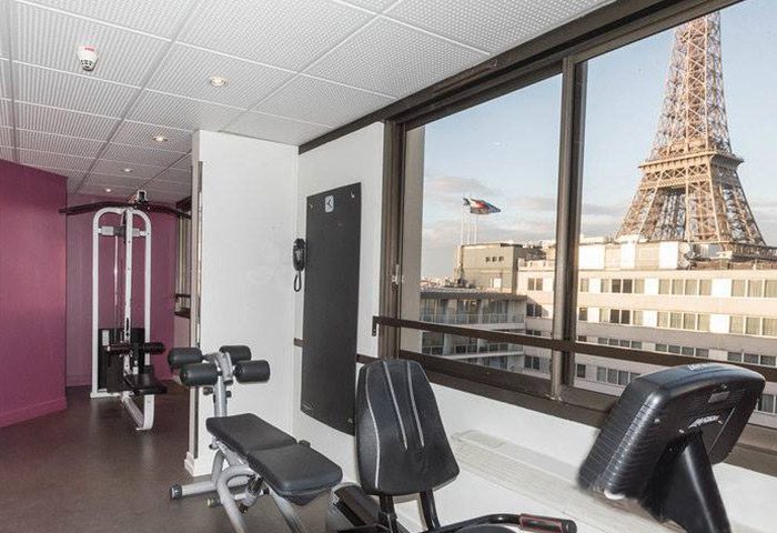 Mercure Paris Centre Tour Eiffel hotel gym. Gay-friendly hotel in Paris city center with Eiffel Tower view. Gym equipment.