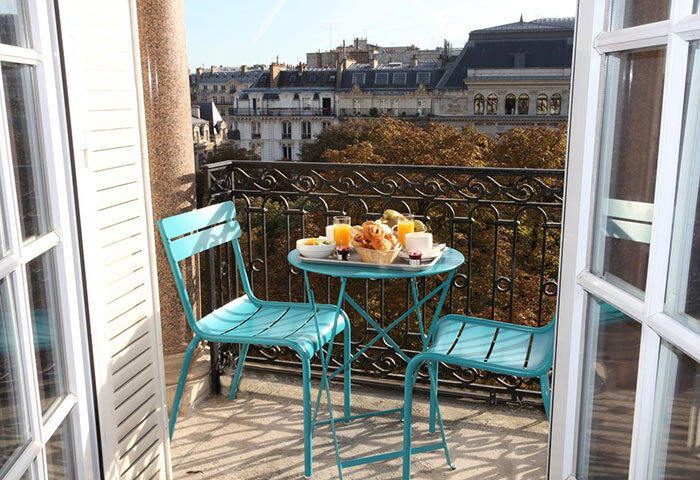 Little Palace Hotel, Paris: Breakfast on a balcony with a view. A romantic honeymoon spot in the Marais gayborhood. Perfect for gay couples.