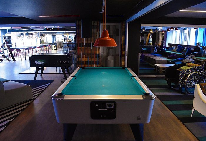 Generator Copenhagen hostel in Vesterbro. Pool table and foosball for gay travelers. Most-booked gay hostel for a fun, social experience.