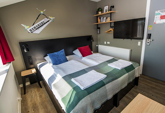 Generator Copenhagen's private room for gay couples. This most-booked gay hostel features a double bed, TV, and modern decor.