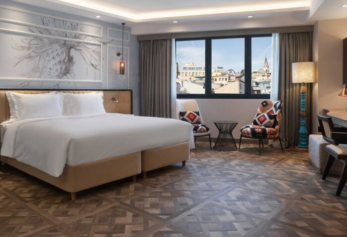 Burdock Hotel Istanbul Autograph Collection room. Modern design, large bed, city view. One of the most booked gay hotels in Istanbul.