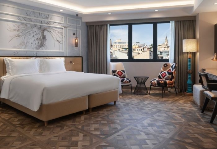 Burdock Hotel Istanbul Autograph Collection room. Modern design, large bed, city view. One of the most booked gay hotels in Istanbul.