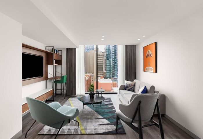 Le Meridien Melbourne hotel room. Modern interior with city view. Gay-friendly hotels near Collingwood's gay bars. Most booked hotel.