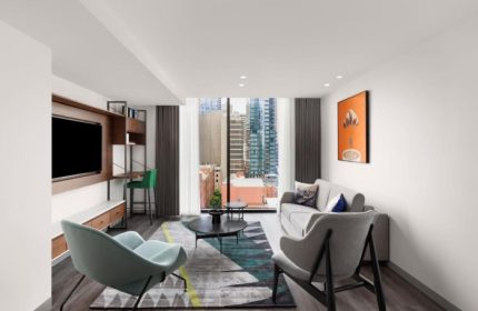 Le Meridien Melbourne hotel room. Modern interior with city view. Gay-friendly hotels near Collingwood's gay bars. Most booked hotel.