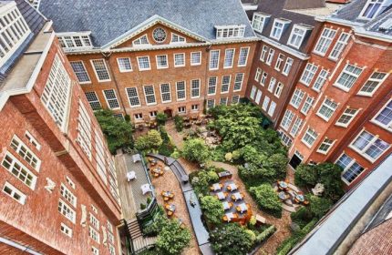 Sofitel Legend The Grand Amsterdam canal view. Gay luxury hotel with courtyard restaurant. Most booked hotels in Amsterdam for gay men.