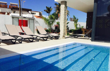 Villa Adler Gay Men Only in Playa del Ingles, Gran Canaria, best gay hotel. Swimming pool and sun loungers for a relaxing vacation.