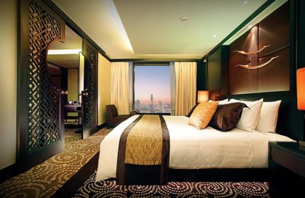 Gay-popular Banyan Tree Bangkok hotel room near Silom's gay bars. Luxury bedroom with city view. Best gay-friendly hotel in Bangkok, Thailand.