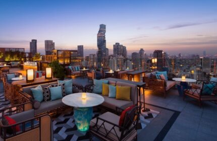 Bangkok Marriott Surawongse rooftop bar view at sunset. One of the most gay popular hotels with city skyline, perfect for gay travel.