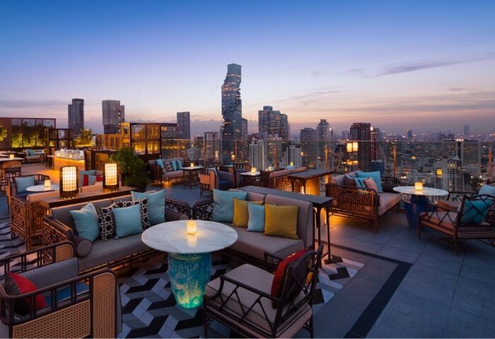 Bangkok Marriott Surawongse rooftop bar view at sunset. One of the most gay popular hotels with city skyline, perfect for gay travel.