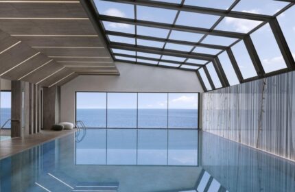 Indoor pool at JW Marriott Hotel Istanbul Marmara Sea. Luxury beachfront wellness hotel with sea view. Gay-friendly travel destination.
