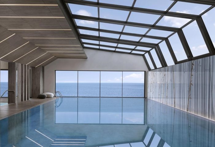 Indoor pool at JW Marriott Hotel Istanbul Marmara Sea. Luxury beachfront wellness hotel with sea view. Gay-friendly travel destination.