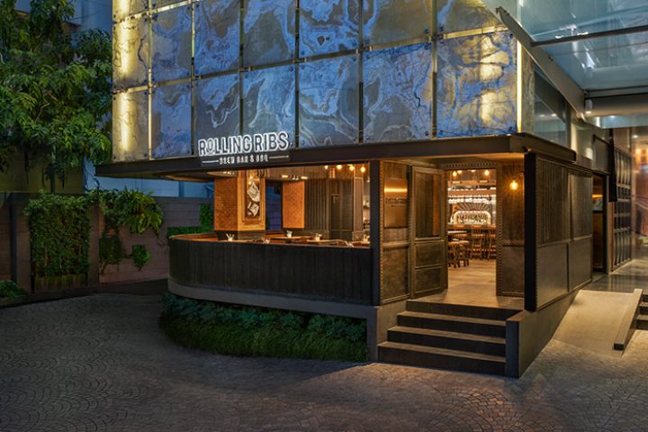 Le Méridien Bangkok's Rolling Ribs Brew Bar & BBQ, a popular restaurant for gay people. Exterior view of the stylish bar and restaurant.