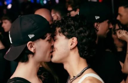 Two men kissing at Muccassassina gay party in Rome. Gay nightlife travel advice. Gay scene in Italy. Gay men travel.