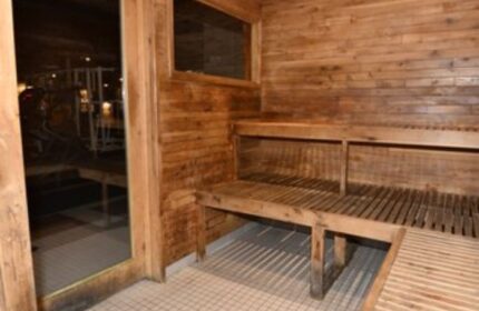 North Hollywood Spa Sauna interior. Wood-paneled sauna with benches. Gay sauna experience, relaxation, and wellness in North Hollywood.