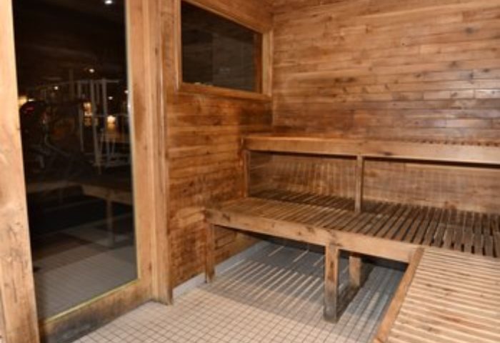 North Hollywood Spa Sauna interior. Wood-paneled sauna with benches. Gay sauna experience, relaxation, and wellness in North Hollywood.
