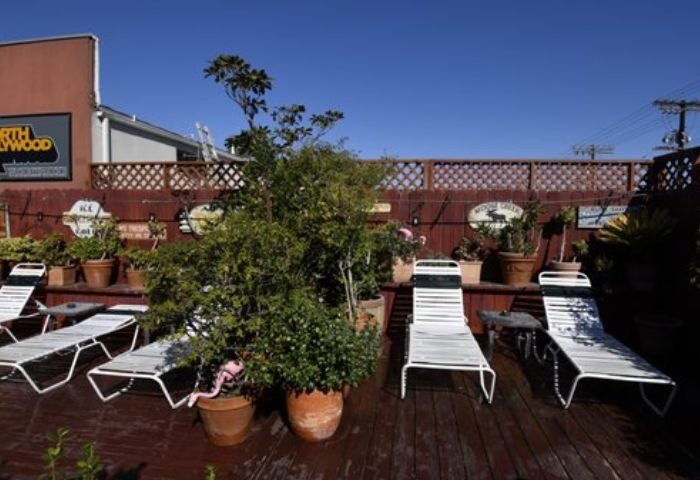 North Hollywood Spa deck with lounge chairs. Relax in style at this gay-friendly spa. Perfect for gay men's travel and leisure.