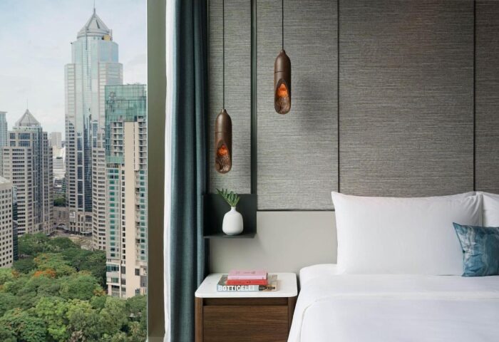 Kimpton Maa-Lai Bangkok hotel room. Modern design with city view. Gay-friendly hotel near Silom, close to gay saunas. Number one gay hotels.