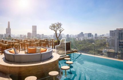 Hôtel des Arts Saigon rooftop pool view. Luxury hotel in Ho Chi Minh City. Number one gay travel destination. MGallery Collection.