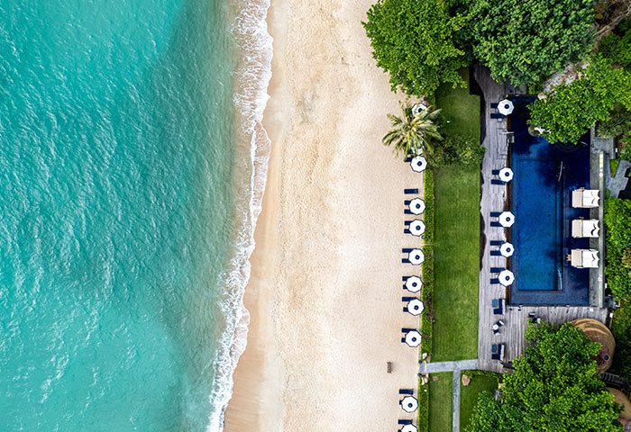 Aerial view of Vana Belle, a Luxury Collection Resort in Koh Samui, Thailand. Beachfront property with pool, ideal for gay travelers.