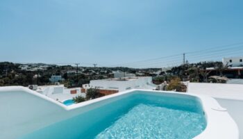 Pool view at Akkadian Gay Only Hotel, Mykonos. Number one gay hotels, offering unique experiences for gay travelers in Mykonos, Greece.