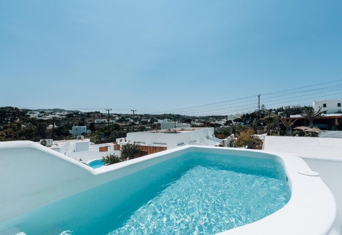 Pool view at Akkadian Gay Only Hotel, Mykonos. Number one gay hotels, offering unique experiences for gay travelers in Mykonos, Greece.
