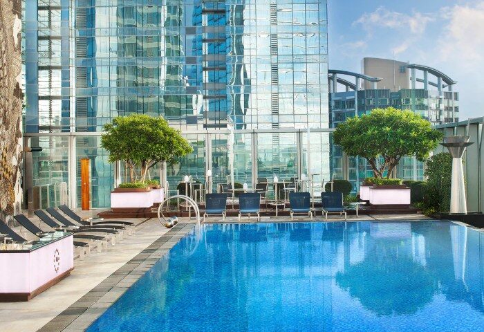 W Hong Kong's luxury pool area. A top gay-friendly hotel near saunas. Perfect for gay travelers seeking a number one hotel experience.