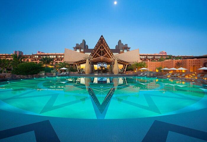Lopesan Baobab Resort pool view. Gay Meloneras beach hotel in Gran Canaria. Luxury travel destination for gay men.