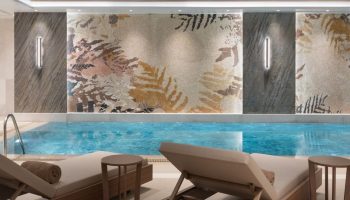 Burdock Hotel Istanbul, Autograph Collection pool. Stylish gay hotel near gay sauna, with loungers, mosaic wall, and relaxing ambiance.