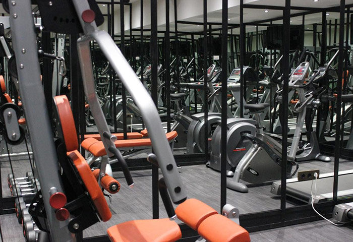 Only YOU Boutique Hotel Madrid gym. Cool design in Chueca gayborhood. Fitness equipment, treadmills, and weights for gay travelers.