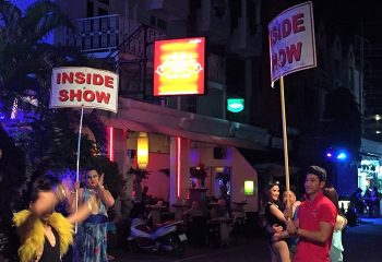 Paradise Complex Patong, Phuket's best gay street. Promoters advertise Inside Show at a bar in the vibrant nightlife district.