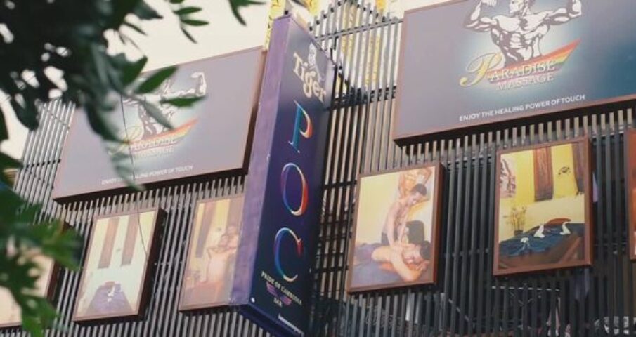 Paradise Massage in Phnom Penh. Exterior view of gay massage parlor with signage and images of men receiving massages. Gay travel advice.