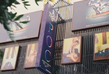 Paradise Massage in Phnom Penh. Exterior view of gay massage parlor with signage and images of men receiving massages. Gay travel advice.