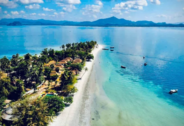 Pawapi Resort Koh Mook, Trang: Aerial view of beach, bungalows, and turquoise sea. Tropical gay travel destination. Paradise island.
