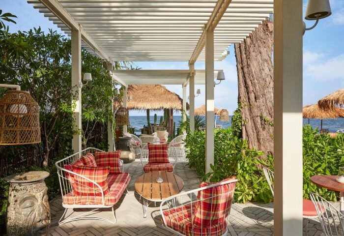 Hua Hin's The Standard gay hotel offers the perfect beach holiday near Bangkok. Relax in stylish outdoor seating with ocean views.