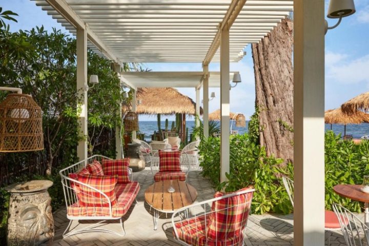 Hua Hin's The Standard gay hotel offers the perfect beach holiday near Bangkok. Relax in stylish outdoor seating with ocean views.