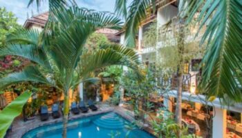 Rambutan Resort Siem Reap: City center hotel pool view. Perfect for gay travelers seeking relaxation and a tropical escape in Cambodia.